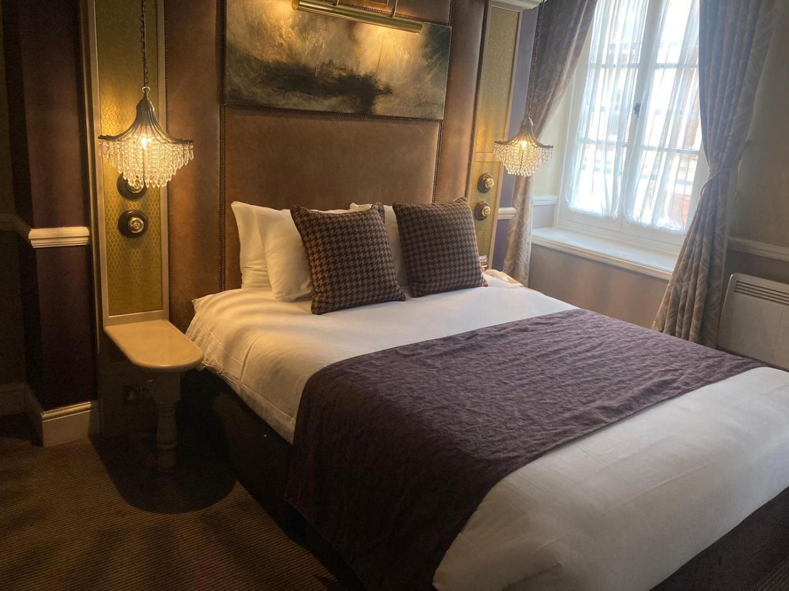 Saracens Head Hotel By Greene King Inns Towcester Dış mekan fotoğraf